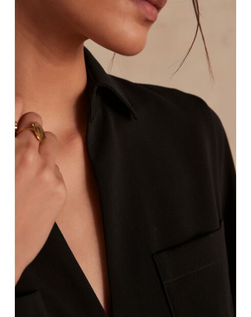 Mono negro Asha Combi