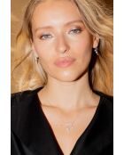 Zilveren oorbellen met een klein staafje van 3 ronde oxiden