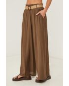 Pantaloni color moka con frange