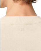Beige T-shirt met hartvriendelijke patch