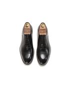 Derbies Christian en cuir noirs
