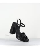 Plateausandalen aus schwarzem Leder mit 11 cm Absatz