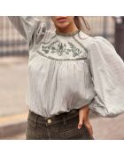Blusa holgada de color verde británico y crudo