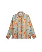 Chemise satinée imprimé plumes Kiwi bleue