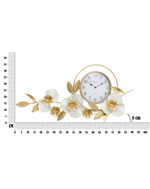 Horloge murale en fer et plastique Flow dorée – 92,5x8x45,5 cm