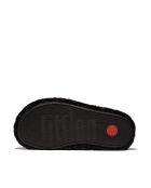 Chaussons Iqushion enveloppantes effet peluche noirs
