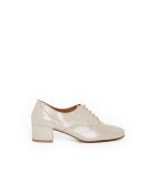 Oxfords Vernie 7 aus goldfarbenem Leder