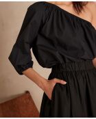 schlichte schwarze Schulterbluse