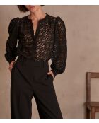 Schwarze Stickbluse mit Kamillenmotiv