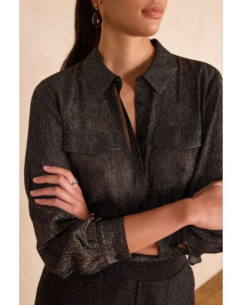 Schwarze glitzernde Bluse
