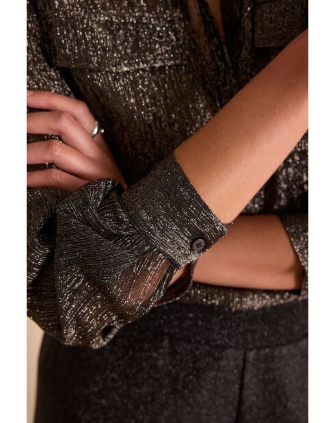 Schwarze glitzernde Bluse