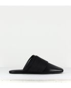 Mules planos de piel negros

-
