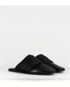 Mules planos de piel negros

-