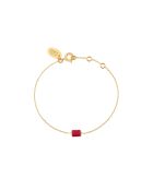 Aurore Armband aus Feingold und besetzt mit einem feinen golden/rosafarbenen Stein