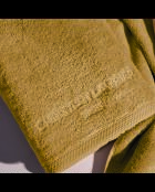 Asciugamano in cotone pettinato LT Oasis giallo senape - 2x (50x100 cm)