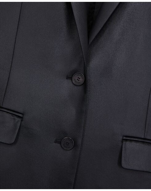 Große Jacke aus schwarzem Stoff mit Kunstledereffekt