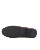 Cuoio Yoki bruine instappers van glad leer
