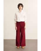 Pantaloni Torres in velluto granato