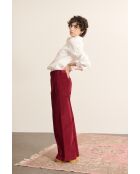Pantaloni Torres in velluto granato