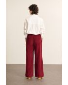 Pantaloni Torres in velluto granato