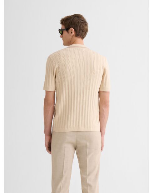Lichtbeige opengewerkte gebreide blouse met knoopsluiting