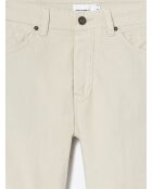 Jeans ajustados de terciopelo marfil