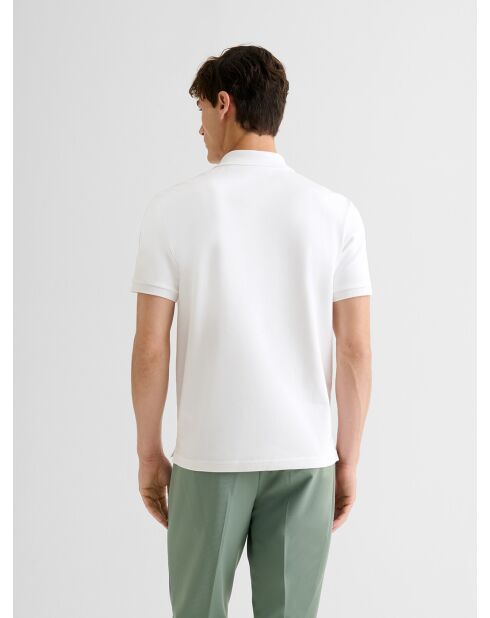Witte katoenen polo met ritssluiting