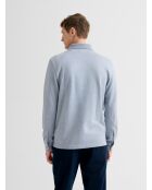 Polo boutonné chiné bleu clair