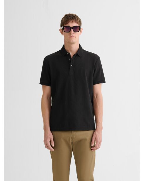 Polo boutonné gauffré noir