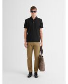 Polo boutonné gauffré noir