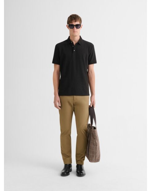 Polo boutonné gauffré noir