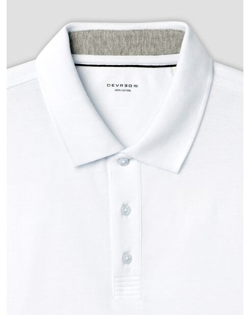 Witte katoenen polo met knoopsluiting