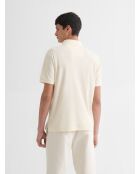 Polo col V effet maille beige clair