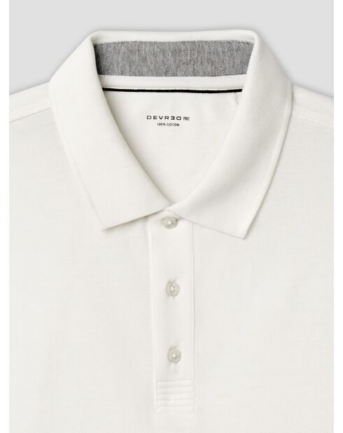 Polo boutonné en coton blanc neige