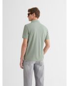 Polo boutonné en coton vert amande