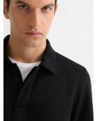 Polo negro regular con botones