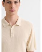 Polo col boutonné jeux de points beige clair