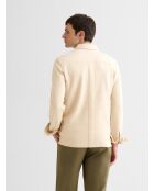 Polo boutonné en jacquard ivoire