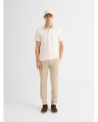 Polo abotonado en jacquard marfil