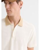 Polo abotonado en jacquard marfil