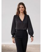Top nero con volant