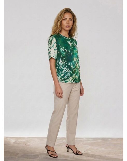 Blusa blanca con lazo y tinte verde