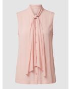 Blusa rosa con volantes