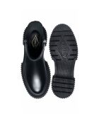 Bottes hautes en cuir à fermeture éclair noires
