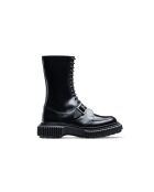Bottes hautes à boucle en cuir et fermeture éclair noires