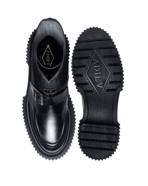 Bottes hautes à boucle en cuir et fermeture éclair noires