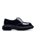 Derbies en cuir noirs