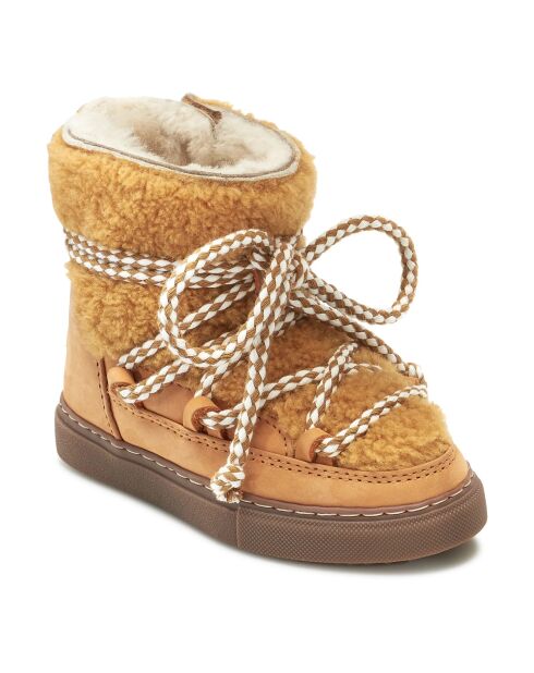 Botas de piel rizada con pelo amarillo