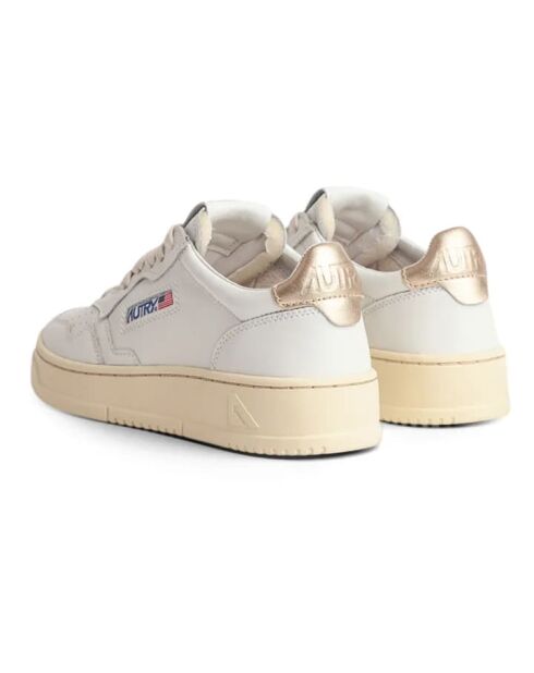 Medalist lage leren sneakers van goudkleurig leer