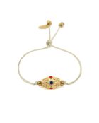 Bracciale Kamala in ottone a maglie nude oro/blu/rosso